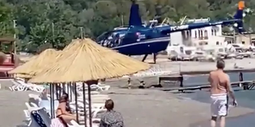 Marmaris'te helikopterin indiği plajdaki işletmeciler: Bizim için çok güzel bir anı oldu, bir tane toz bile kalkmadı