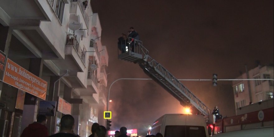 Antalya'da iki katlı binada çıkan yangında can pazarı