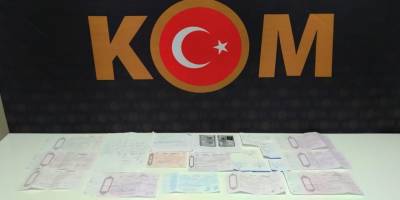 21 kişiyi dolandıran tefecinin evinden yüklü meblağda senet çıktı