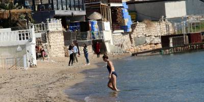 Aydın'da yerli ve yabancı turistler denizin keyfini çıkardı