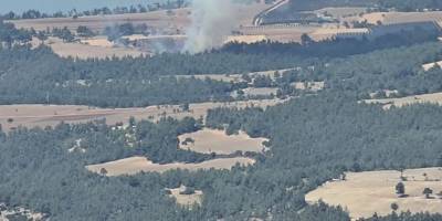 Canlı yayın yaparken helikopter üzerine su boşalttı