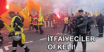 Paris'te yüzlerce öfkeli itfaiyeciden, ses ve sis bombalı protesto gösterisi