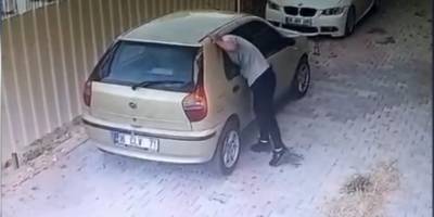 Bursa’da gözüne kestirdiği çantayı otomobilin camını patlatarak çaldı