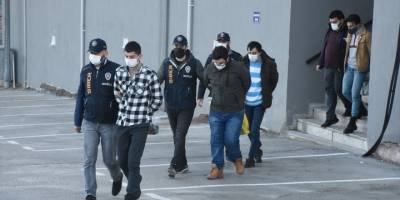 Muğla merkezli dolandırıcılık operasyonunda yakalanan 11 şüpheli adliyeye sevk edildi