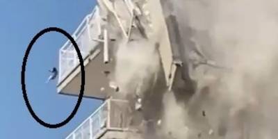 Bina yıkılırken düşen kedi ağır yaralandı: O anlar kamerada