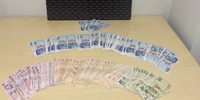 Söke'de sahte parayla alışveriş yaptıkları iddiasıyla gözaltına alınan 2 şüpheliden 1'i tutuklandı