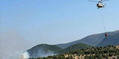 Balıkesir'de ormanlık alandaki yangına müdahale ediliyor