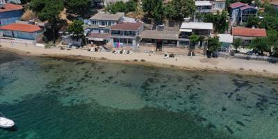 Balıkesir'de deniz çayırlarını iş makinesiyle söken operatöre 774 bin lira ceza uygulandı