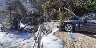 Fethiye'de depoda çıkıp otomobile sıçrayan yangın söndürüldü