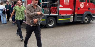 Mazgala düşen kayıp köpek ve yangında mahsur kalan kediler itfaiyenin çabasıyla kurtarıldı